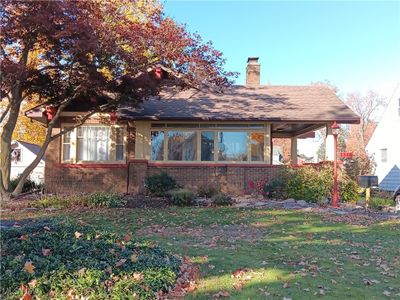 View of front of home with a front yard | Image 1