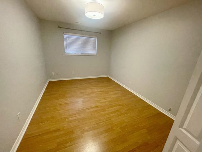 Spare room with light wood finished floors and baseboards | Image 37