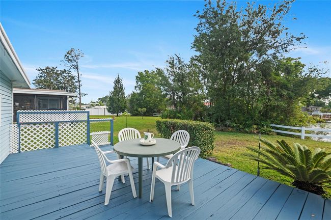 Your back patio on the pond | Image 17