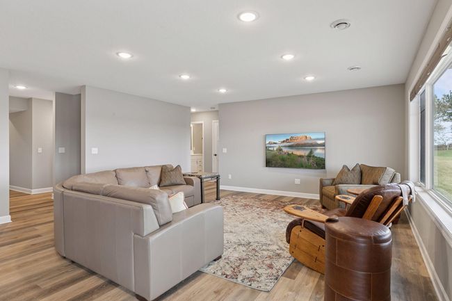 Basement family room and full wet bar area | Image 36