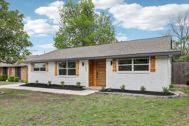 Ranch-style house featuring brick siding, a shingled roof, and a front lawn | Image 29