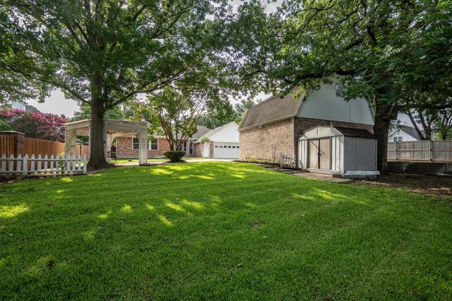 The yard from from the back of the property line. | Image 33