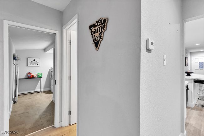 Hallway featuring separate washer and dryer | Image 21