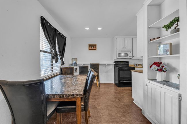 Dining space featuring recessed lighting | Image 5