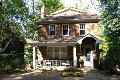 Offering this charming, level entry home with 4 bedrooms & 3 full bathrooms. | Image 1