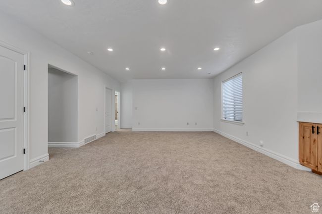 Unfurnished room featuring recessed lighting and light carpet | Image 31