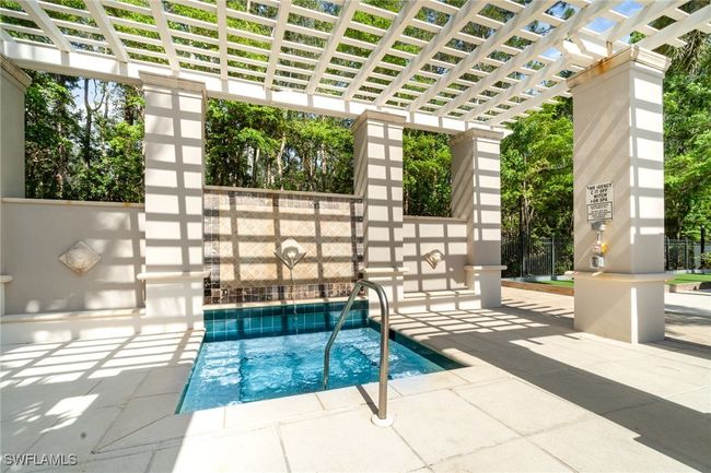 View of swimming pool with a pergola, a patio area, and a pool | Image 21