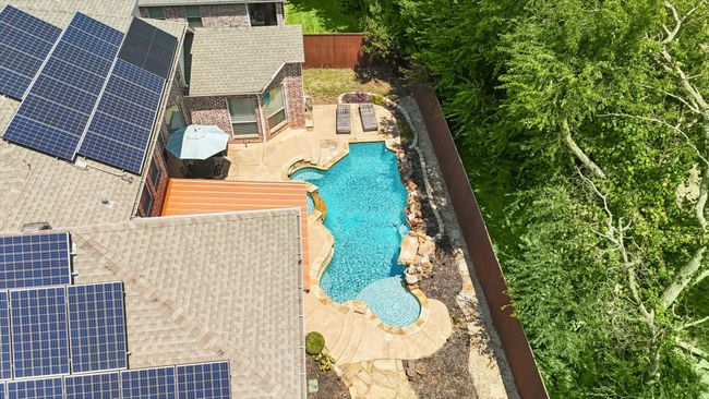 View of PAID OFF solar panels and swimming pool | Image 37
