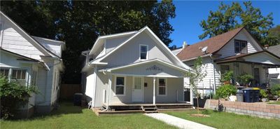 View of exterior entry featuring a porch | Image 2