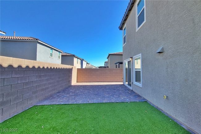 View of yard featuring a patio and a fenced backyard | Image 20