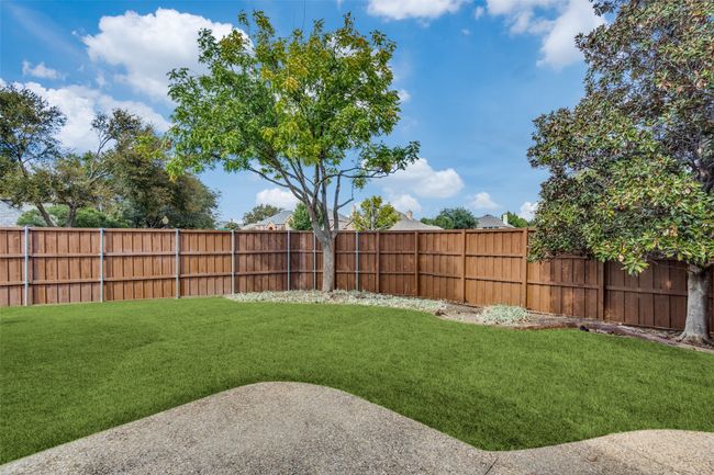 New privacy fence encloses the back yard. | Image 19
