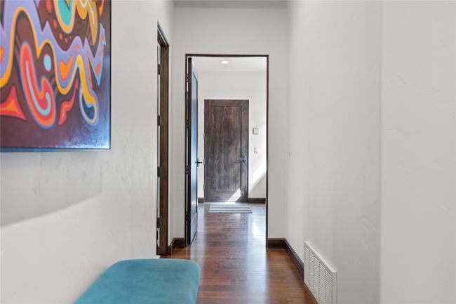 Hallway to mudroom and garage. | Image 55