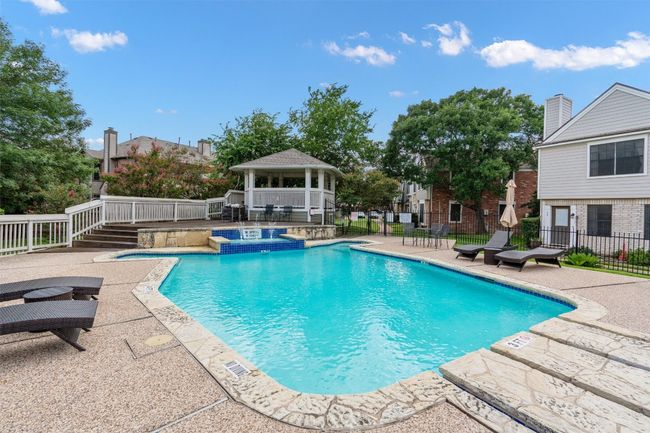 Community pool with an in-ground hot tub, a gazebo, and a patio | Image 20