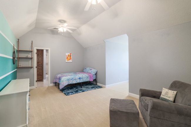 Large bedroom #3 upstairs with dormer window and ensuite bath. | Image 24