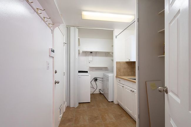 Laundry area featuring washer and dryer | Image 21