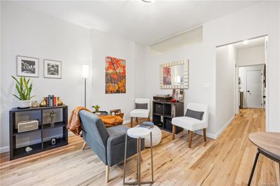 Living area featuring wood-type flooring | Image 2