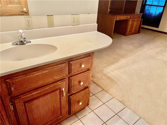 Bedroom on other side of bath has its own dressing area with sink | Image 37