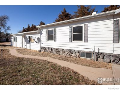 405 N Washington Avenue, House other with 2 bedrooms, 2 bathrooms and 2 parking in Fleming CO | Image 3