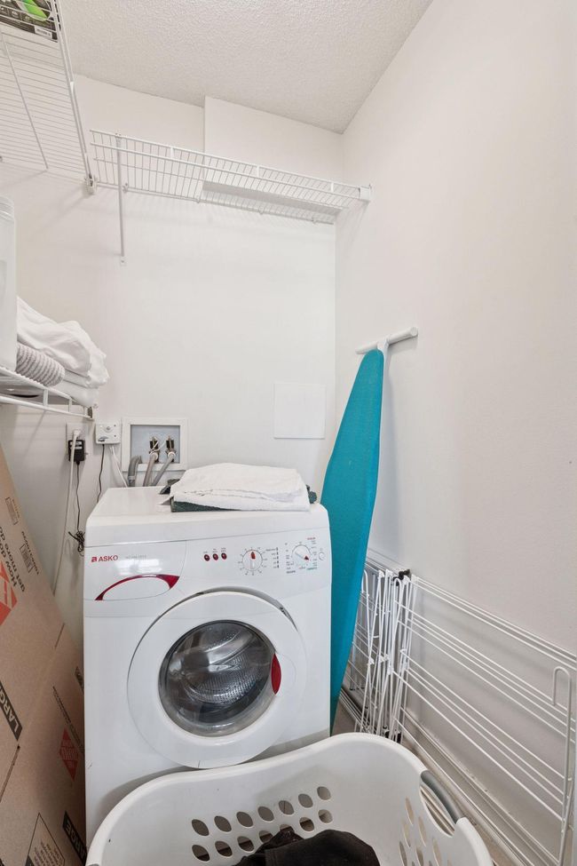 Convenient in-unit washer/dryer hookups—a top priority for buyers valuing easy condo living without trips to shared laundry rooms. | Image 26