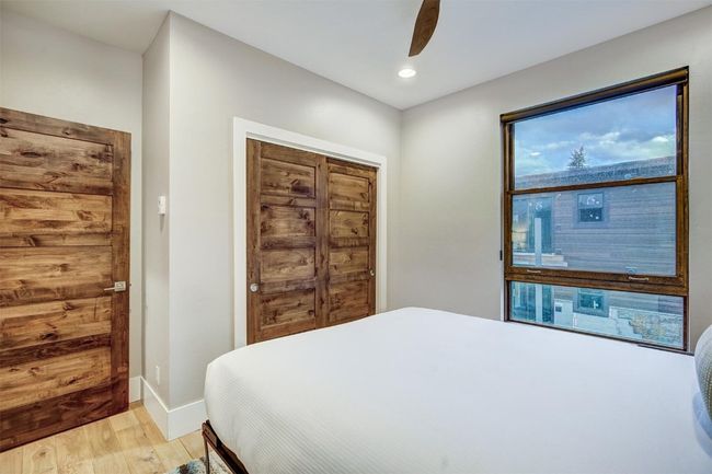 Bedroom with recessed lighting, a ceiling fan, light wood-style flooring, and baseboards | Image 29