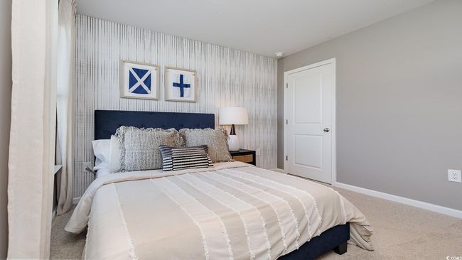 Carpeted bedroom featuring baseboards | Image 23