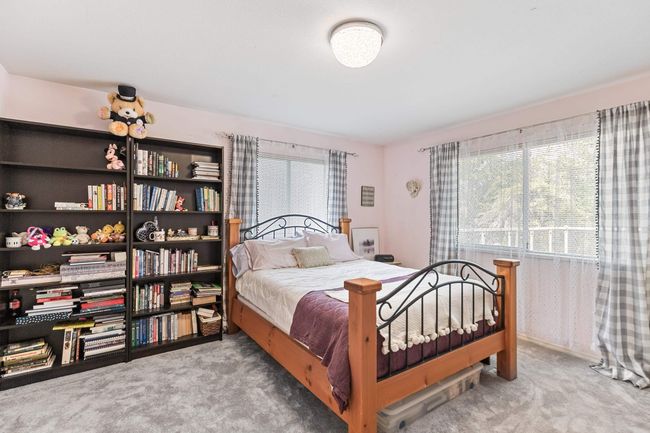 Bedroom with carpet floors | Image 26