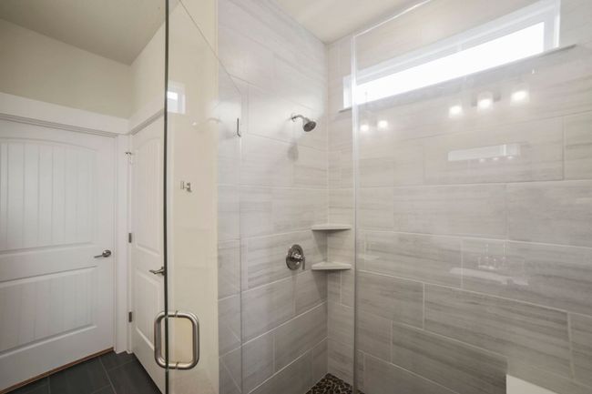 Bathroom with a shower stall | Image 25