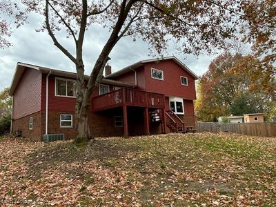 Rear of property-super deck with patio below | Image 3