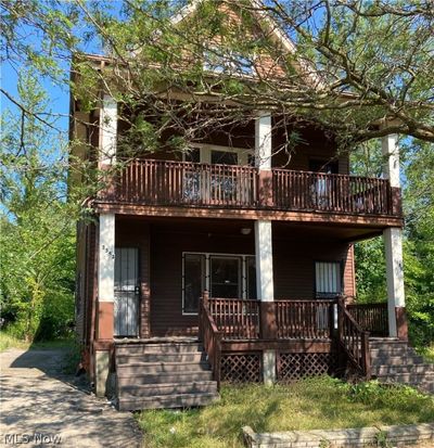 Back of house with covered porch | Image 1