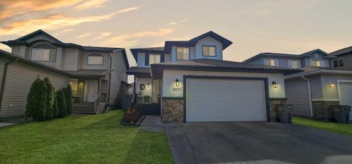 11257 81 Avenue, Home with 4 bedrooms, 3 bathrooms and 4 parking in Grande Prairie AB | Card Image