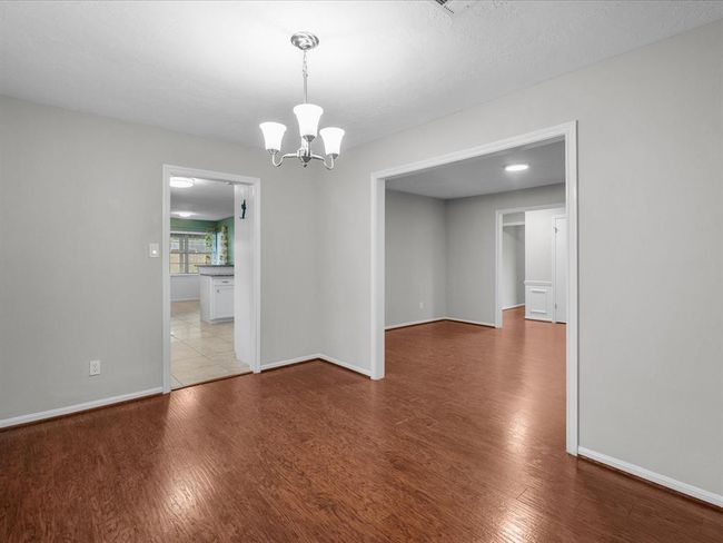 View from formal dining rooom looking into the formal living room to your right | Image 11