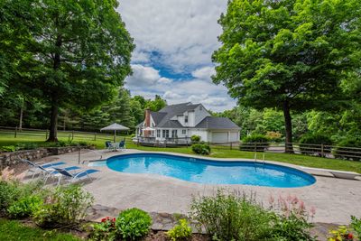 Privately set, heated 9' pool. Heated via heat pump for energy efficiency. | Image 2