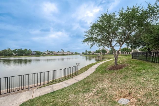 Peaceful walking trails surround all the lakes and water features. | Image 30