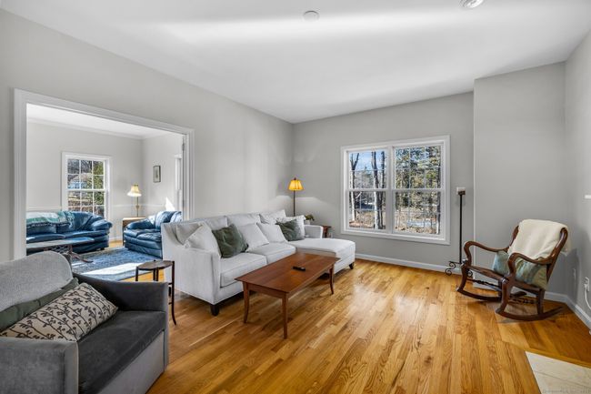 The kitchen with breakfast nook / dining area flows seamlessly to the family room. | Image 11