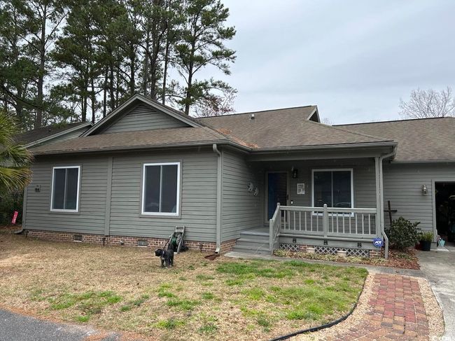 Ranch-style home featuring covered porch, roof with shingles, crawl space, and a front lawn | Image 27