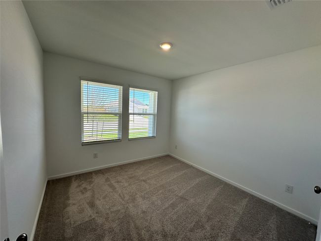 Empty room with carpet floors and baseboards | Image 9