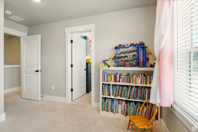 Living area featuring carpet flooring and baseboards | Image 17