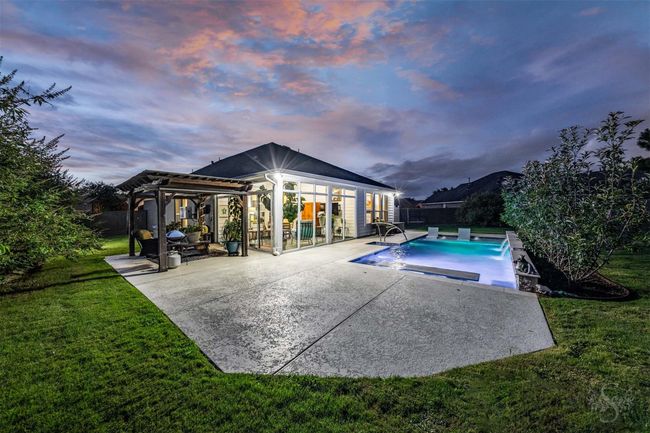 This harmonious blending of water, play, and contemporary architecture creates a captivating and inviting atmosphere. | Image 7