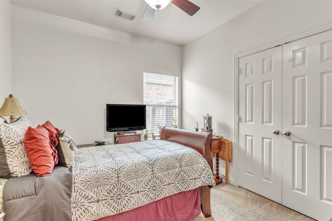 Bedroom featuring carpet floors, a closet, and ceiling fan | Image 13