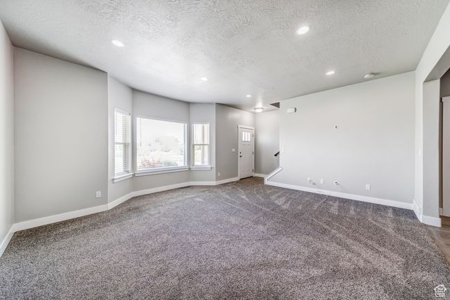 Spare room with carpet floors, recessed lighting, and baseboards | Image 4