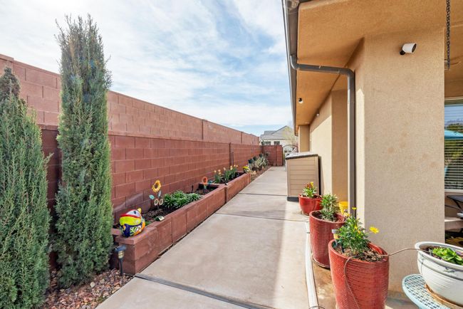East side with garden spot & storage | Image 41