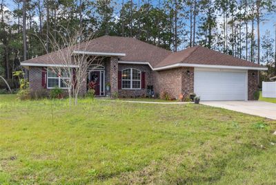 21 Kaufman Place, House other with 4 bedrooms, 3 bathrooms and null parking in Palm Coast FL | Image 1