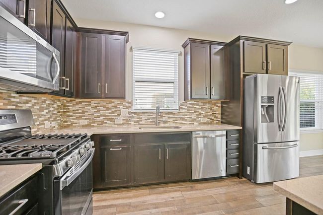 5834 Caldera Ridge Dr, House other with 4 bedrooms, 3 bathrooms and null parking in LITHIA FL | Image 4