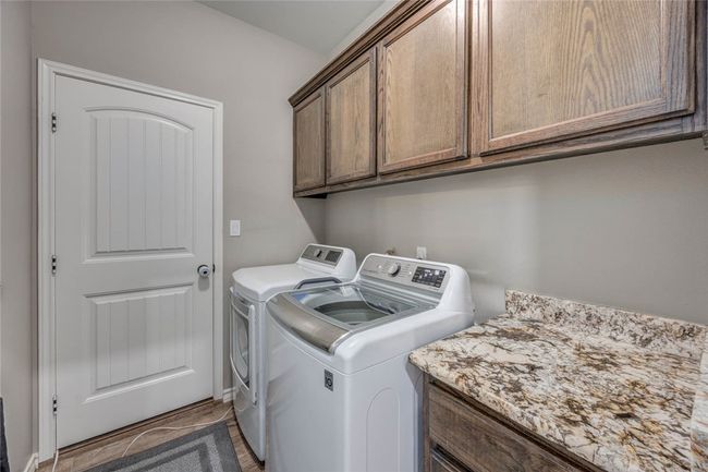 laundry room off the kitchen | Image 24