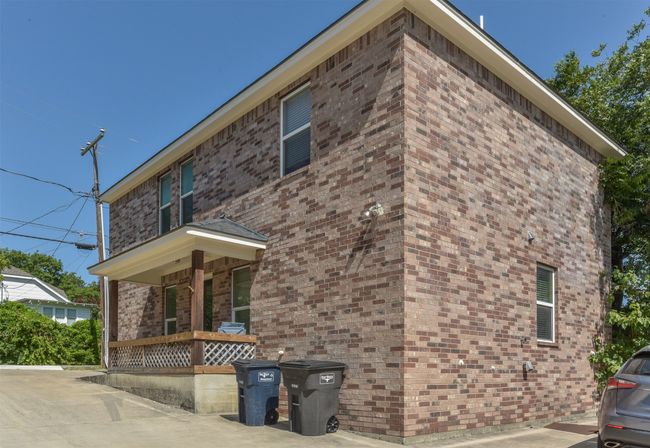 View of home's exterior with a porch | Image 17