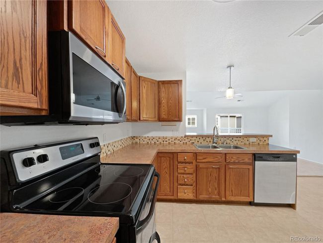 UNIT-307 - 10818 Cimarron St, House attached with 2 bedrooms, 2 bathrooms and null parking in Firestone CO | Image 21