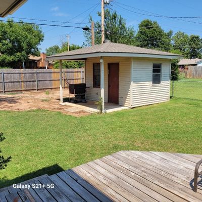 View of outbuilding with a yard | Image 2