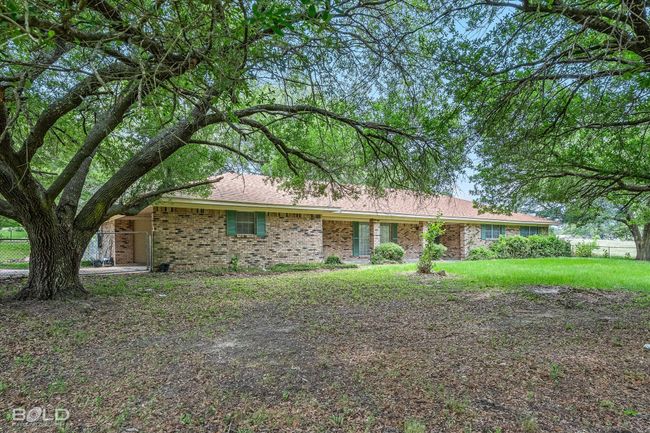 Single story home with brick siding | Image 26