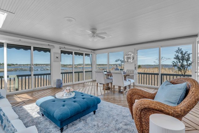 The Sunroom With Its Floor To Ceiling Windows Allows The Interior Spaces To Blend Beautifully With The Natural Surroundings | Image 14
