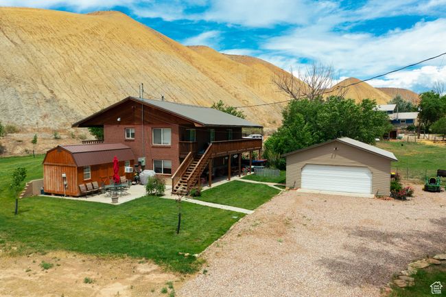 Brick home exterior and metal roof | Image 6